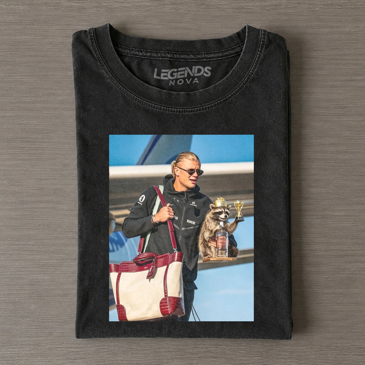 “Others hold trophies after matches, I hold my raccoon”T-shirt
