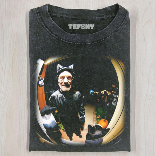 CAT PLAYING WITH T-SHIRT