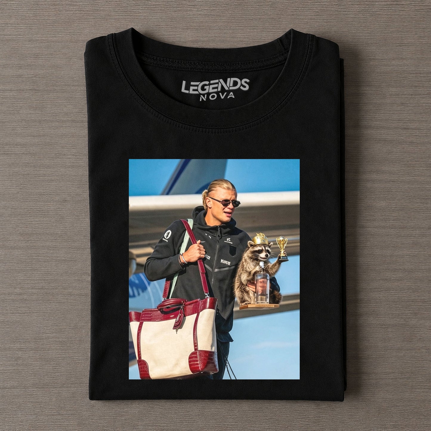 “Others hold trophies after matches, I hold my raccoon”T-shirt